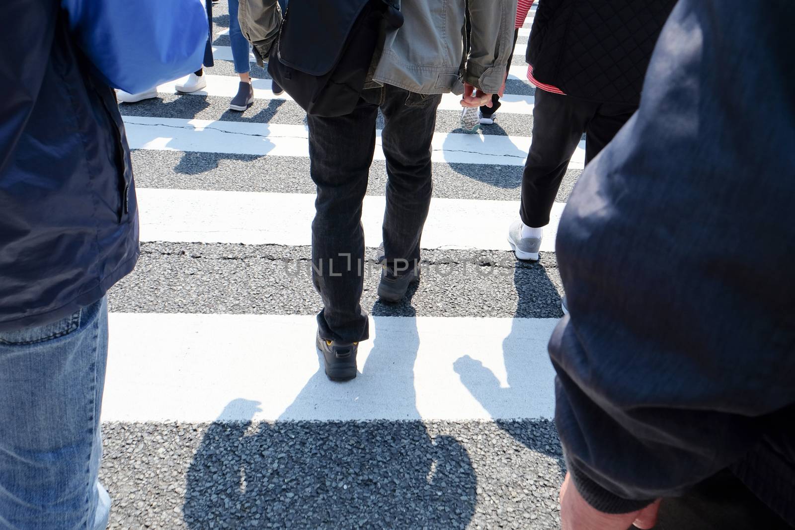 Pedestrians cross at Shibuya Crossing,Tokyo Japan