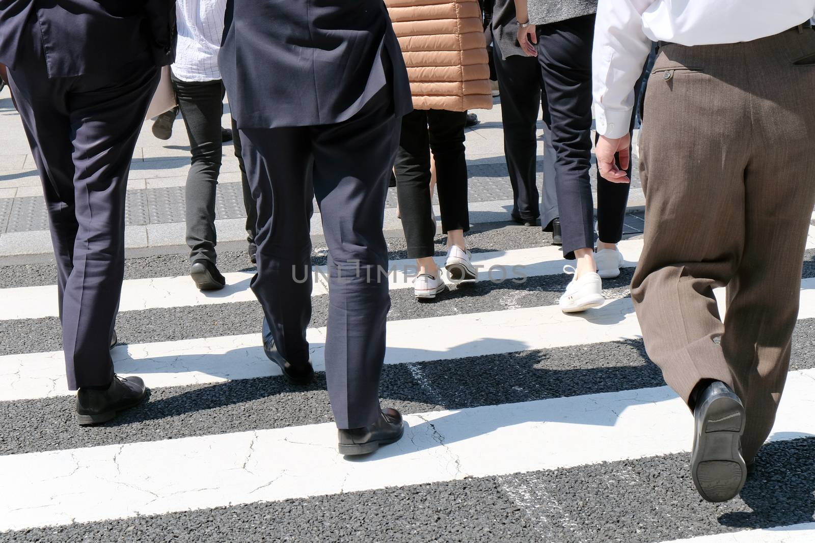 Pedestrians cross at Shibuya Crossing,Tokyo Japan