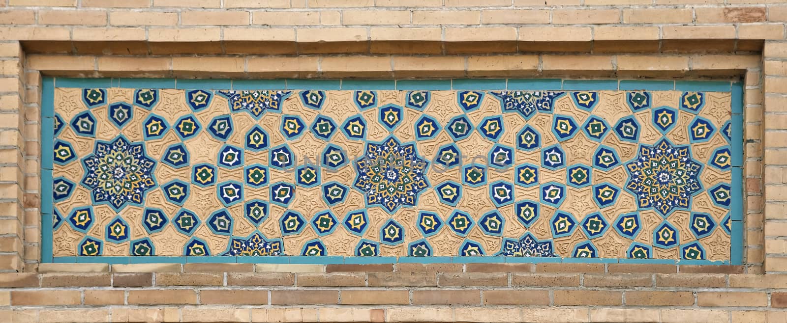Old Eastern mosaic on the wall, Uzbekistan by Goodday