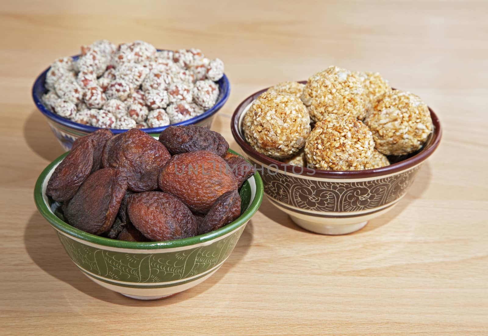 Oriental sweets in bowls on a table