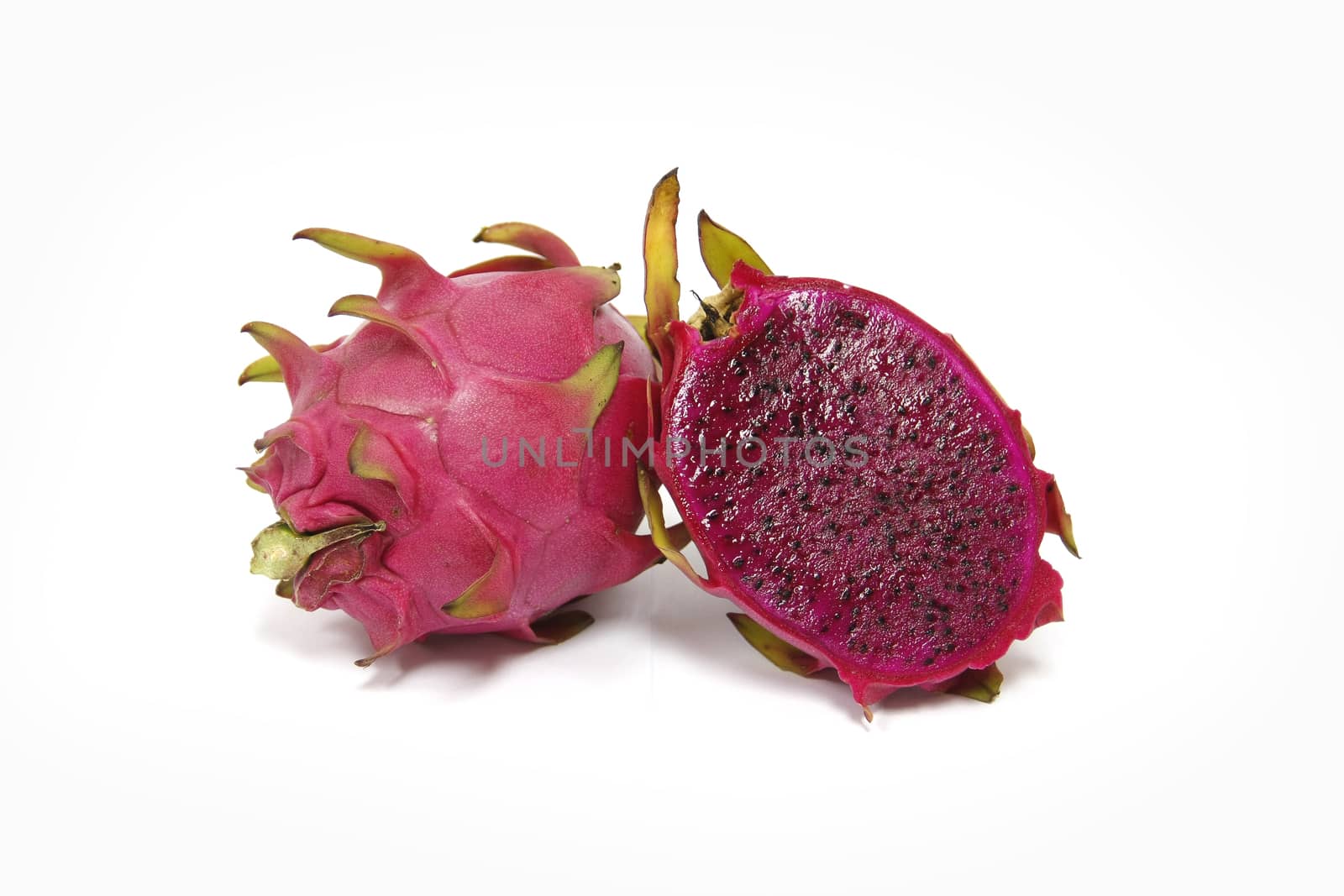 Purple dragon fruit on white background