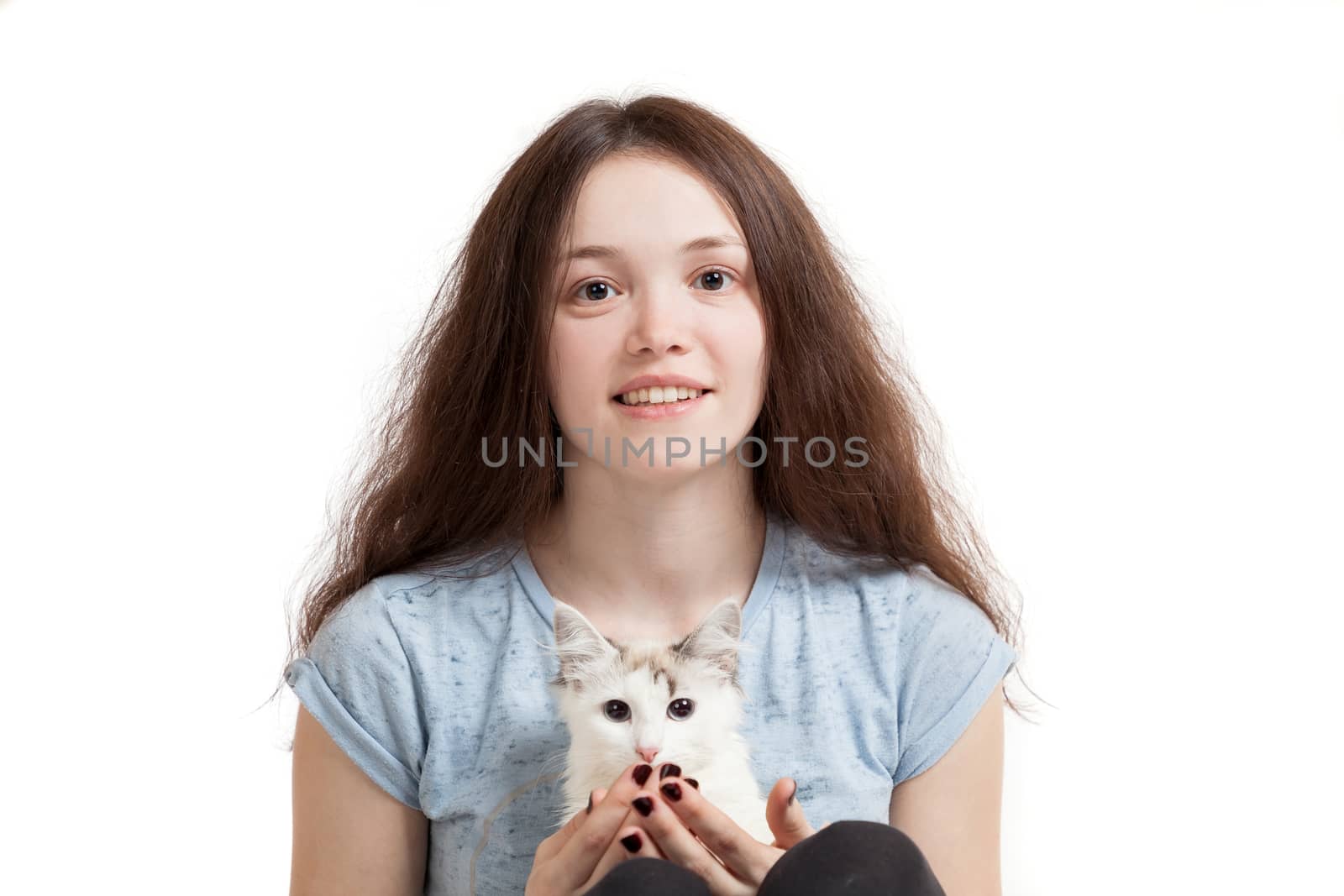 the young beautiful girl and her cat on a white background