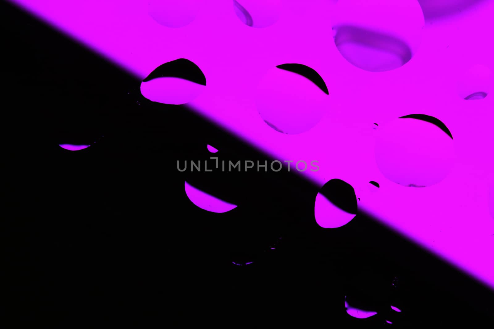 Abstract Background with Oil Drops on Black - Pink