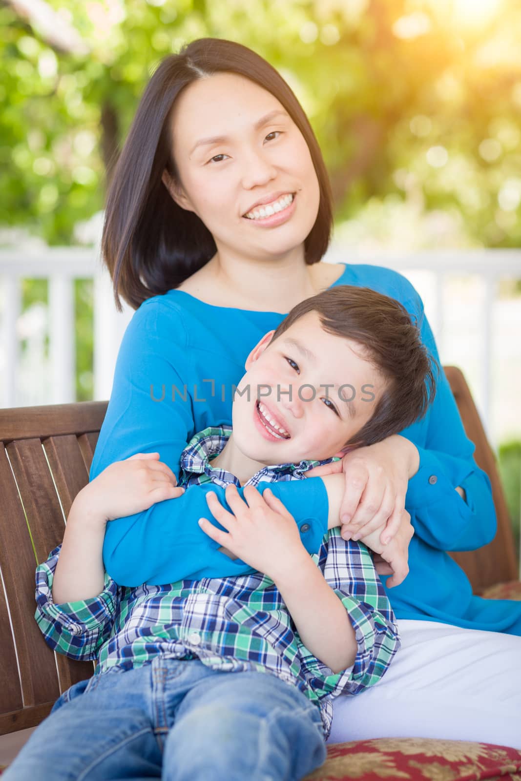 Outdoor Portrait of Chinese Mother with Her Mixed Race Chinese and Caucasian Young Boy