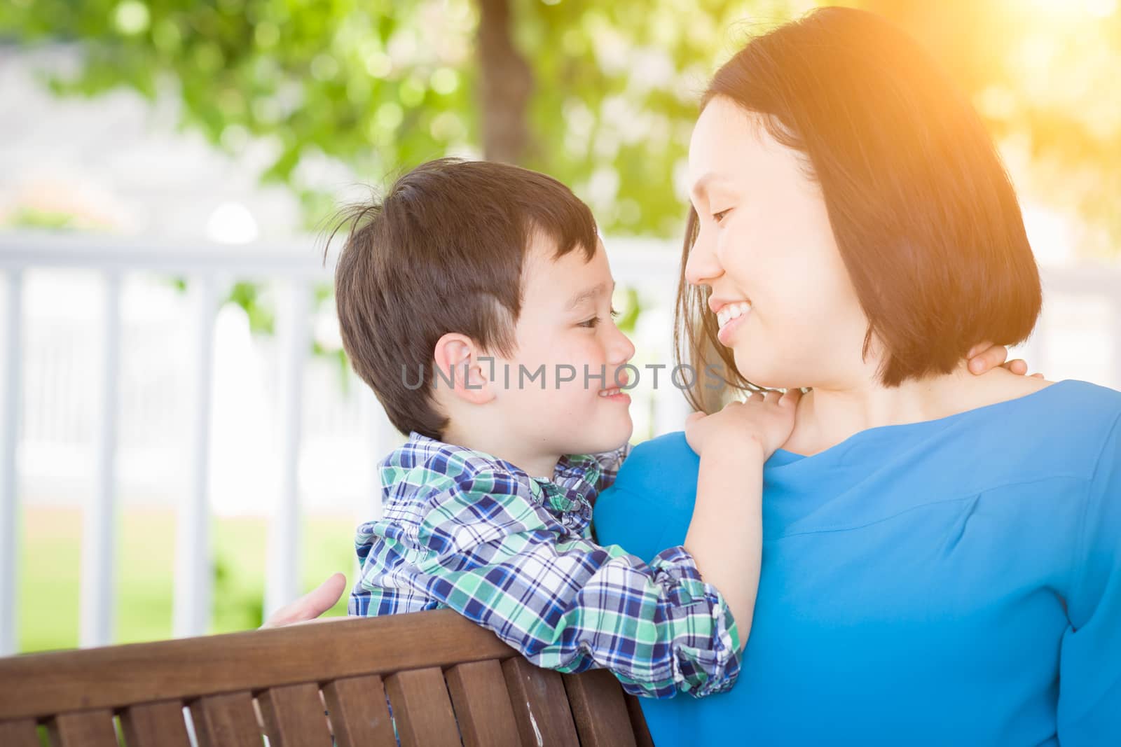 Outdoor Portrait of Chinese Mother with Her Mixed Race Chinese and Caucasian Young Boy