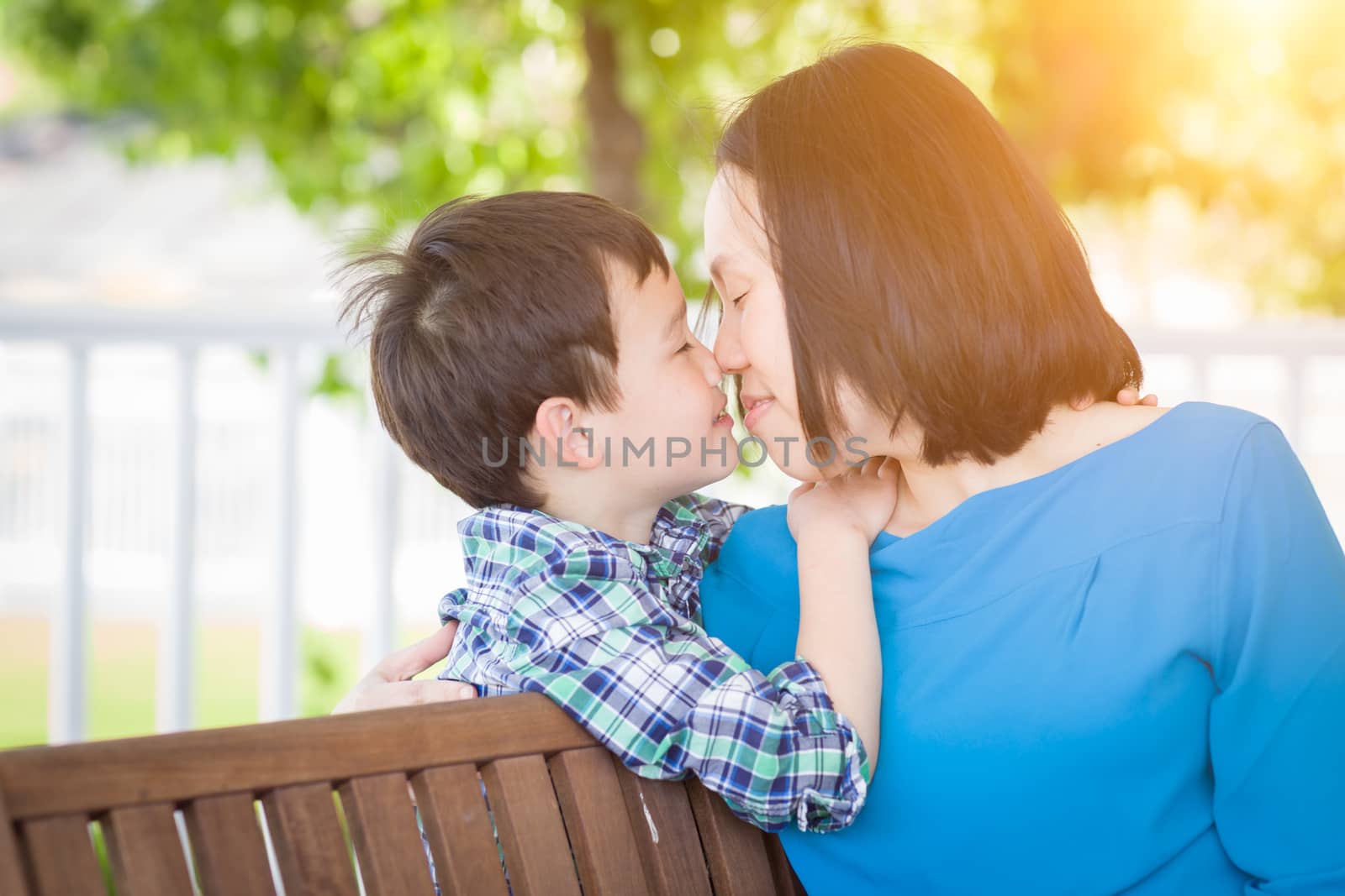 Outdoor Portrait of Chinese Mother with Her Mixed Race Chinese and Caucasian Young Boy