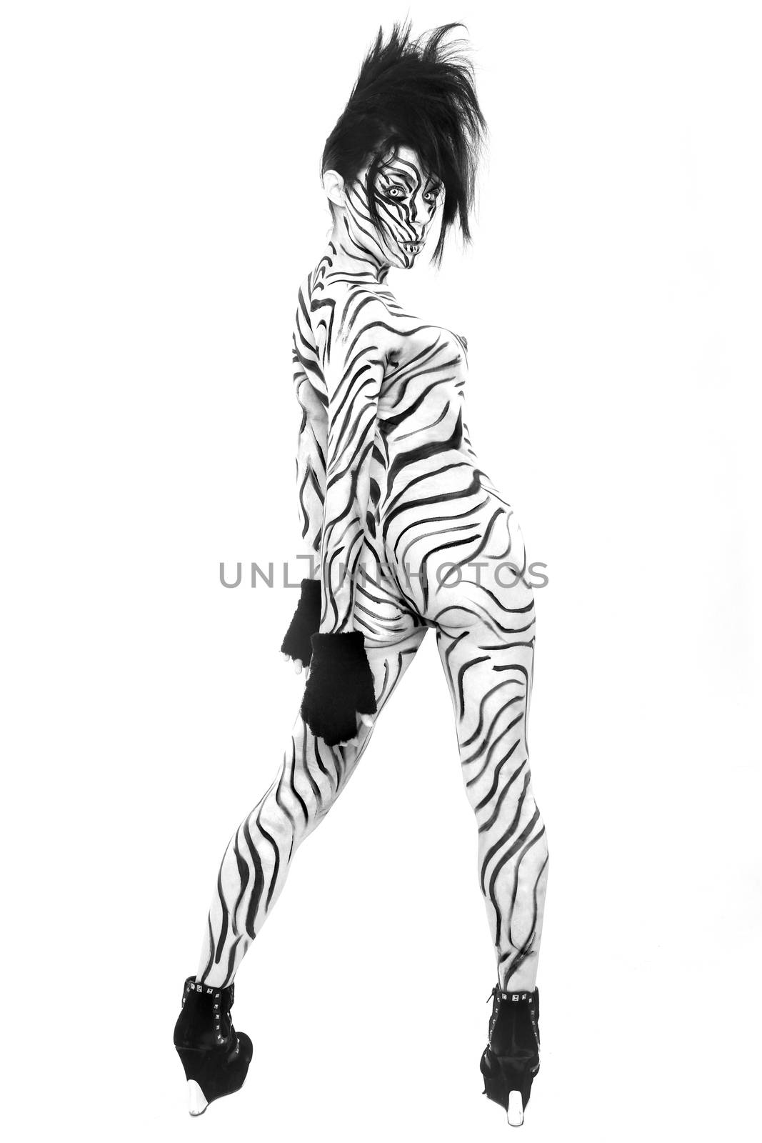 Fierce Nude Woman Body Painted as a Zebra 