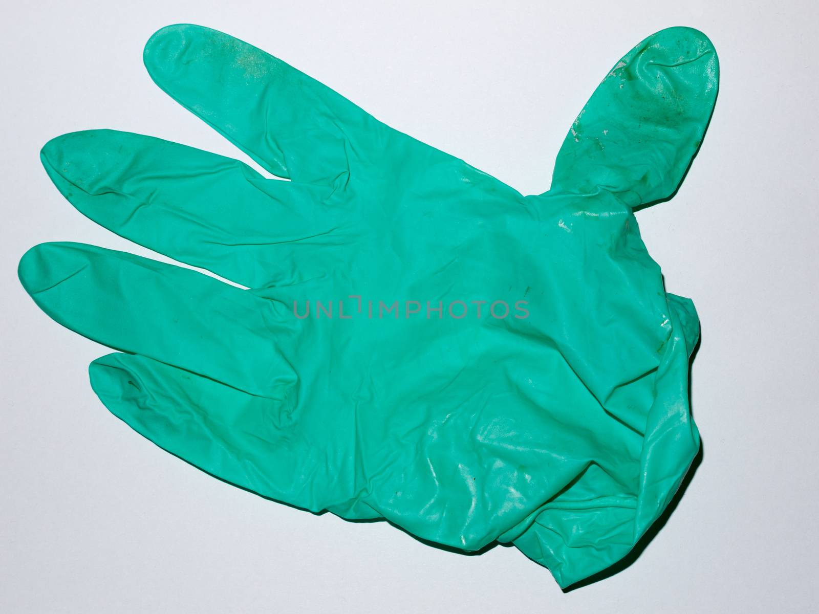 A dirty gloves on a white background