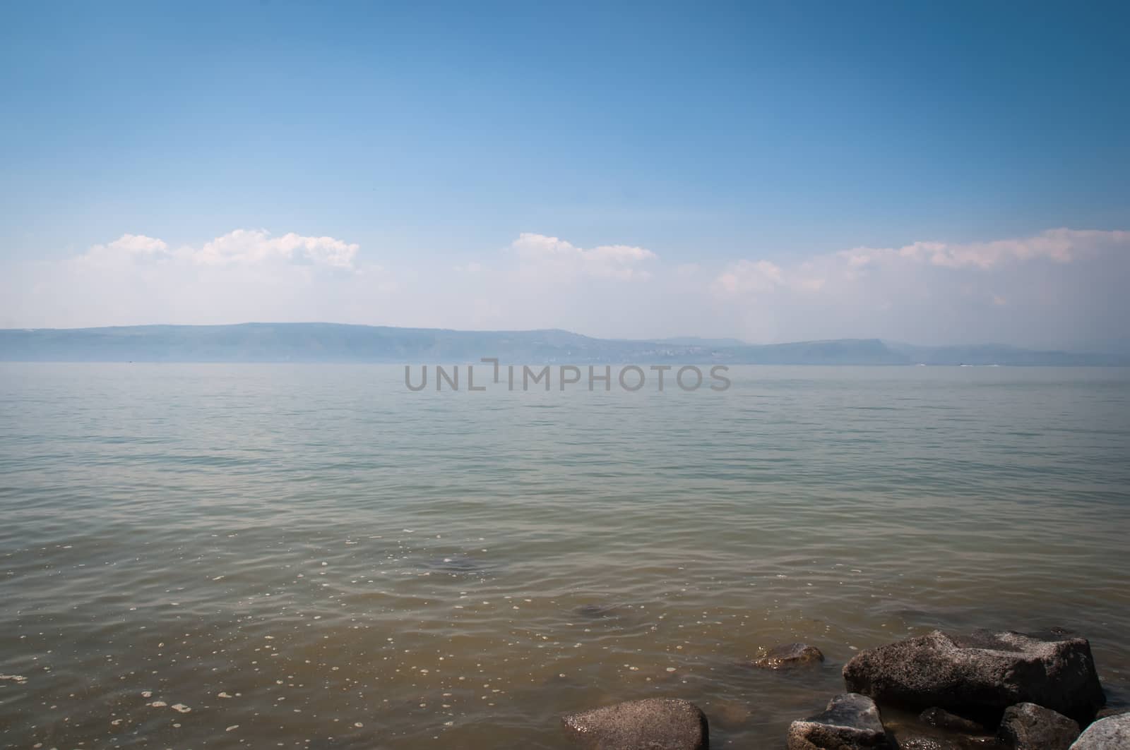 Sea of Galilee with the mountains . Israel . by LarisaP
