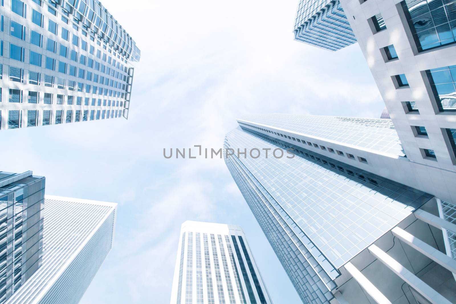 View of modern blue colored contemporary office city buildings