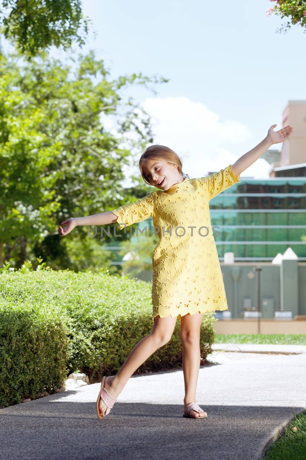 portrait of happy girl  having good time in summer environment