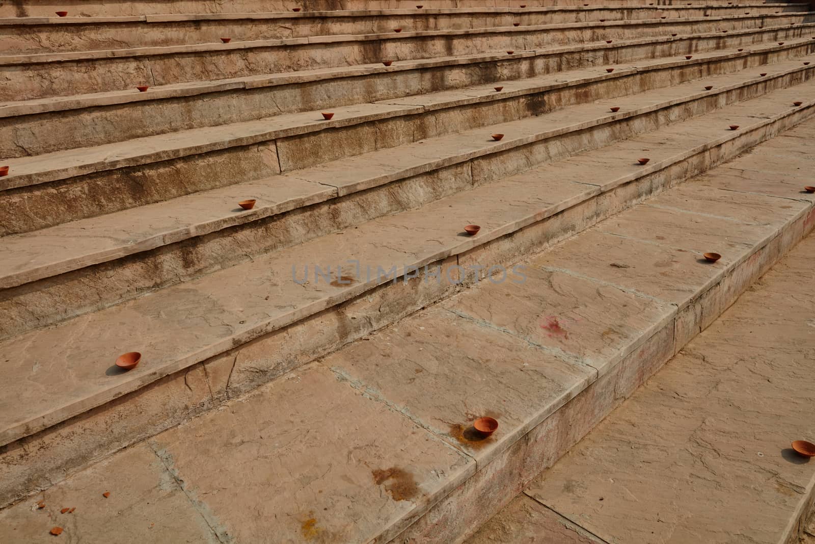 Clay plates arranged on the stairs for diwali celebration in India