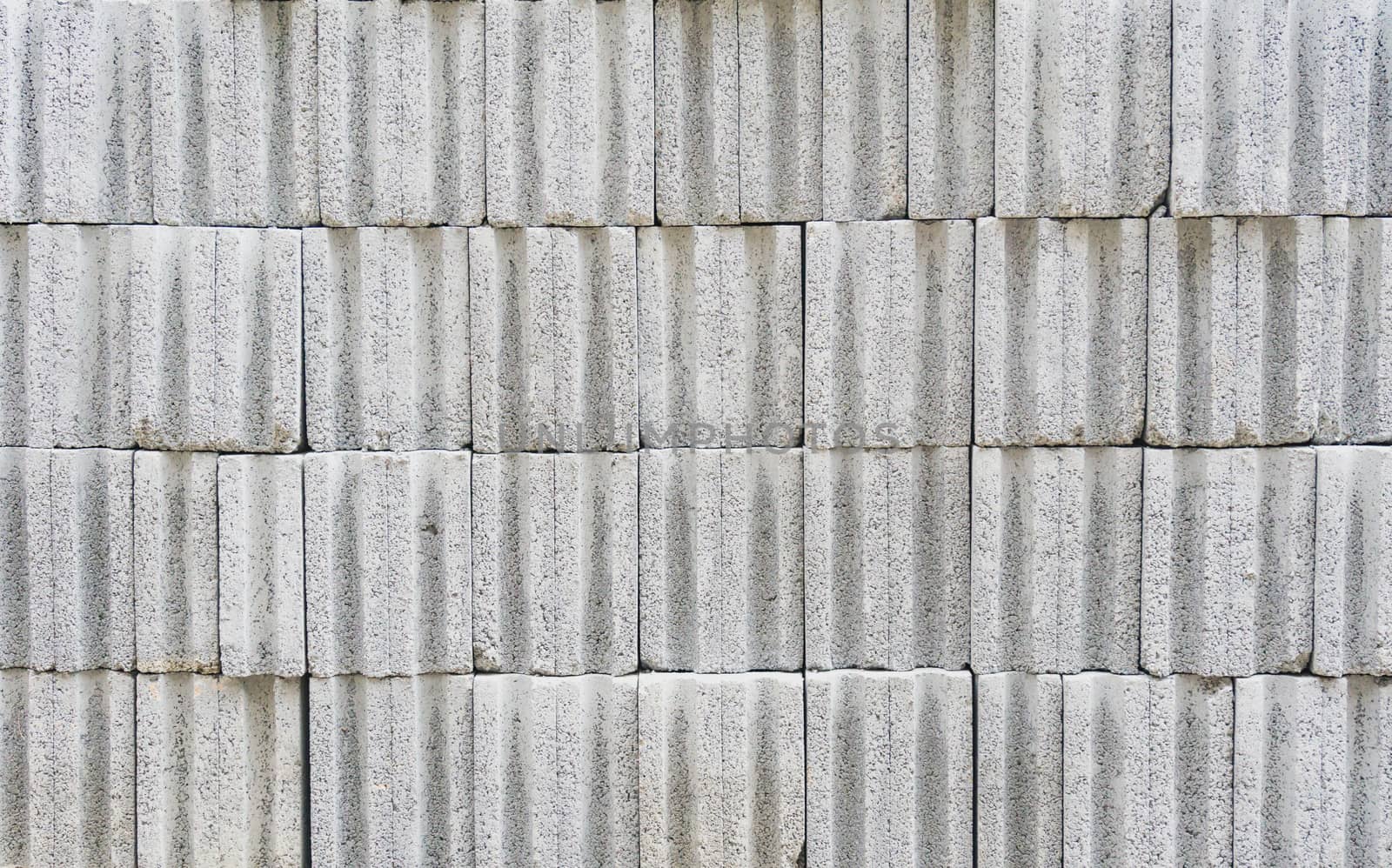 Close up of a cement brick wall by nopparats