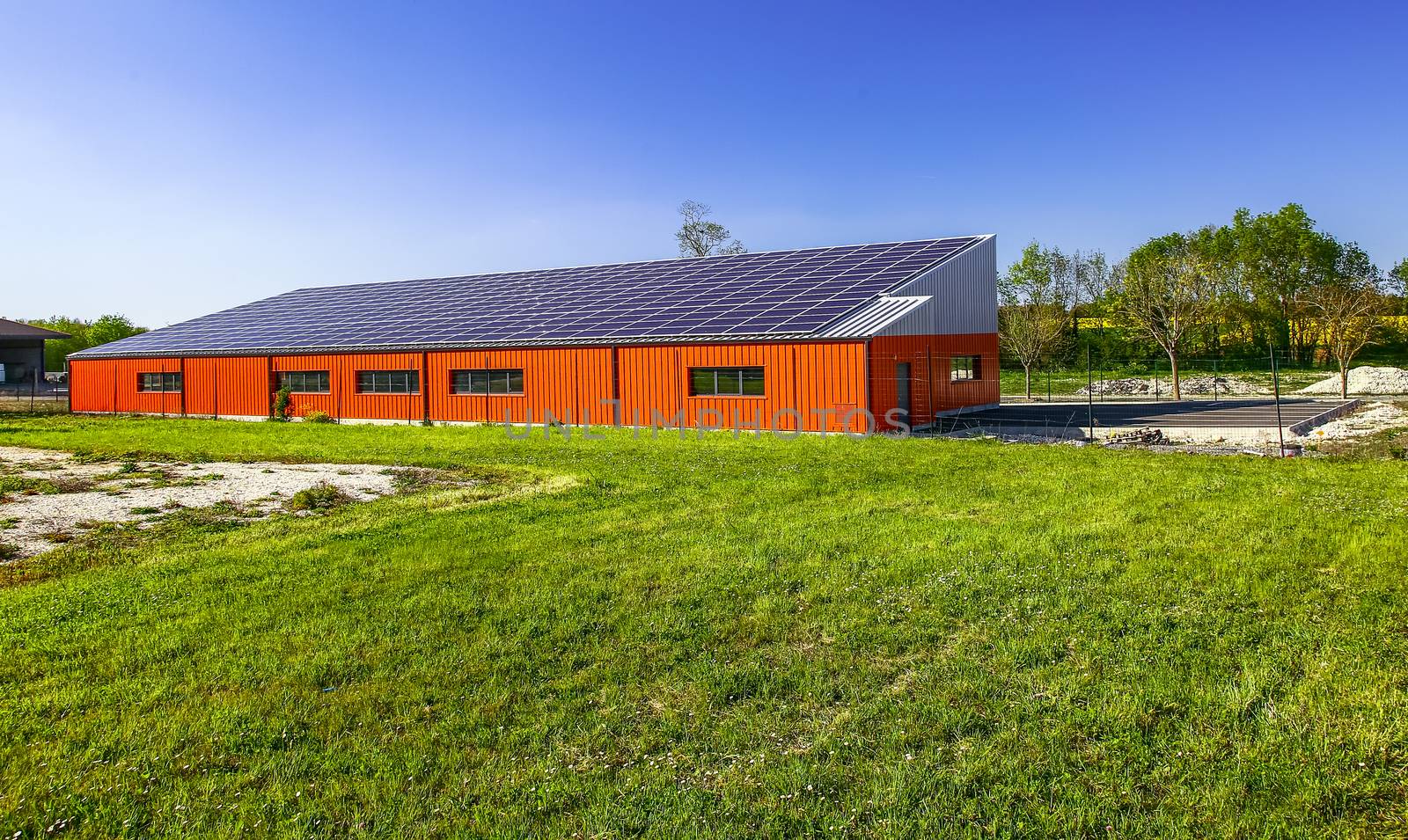 Surgeres, France - April 09, 2017:Solar panel on a roof of commercial warehouse