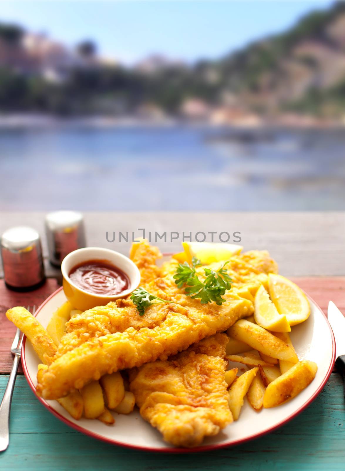 Fish and chips by the sea by unikpix