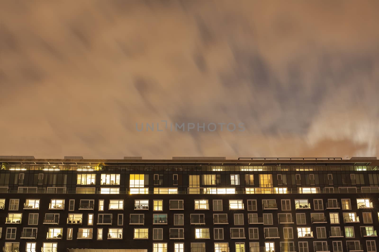 Modern apartment block at night