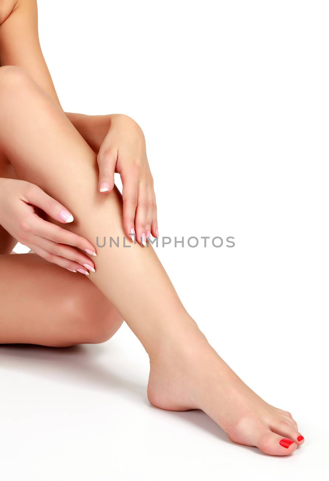Woman's legs on white background, isolated by Nobilior