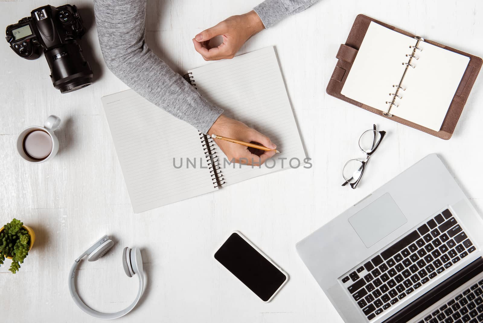 Top view of businessman at workplace with copy space