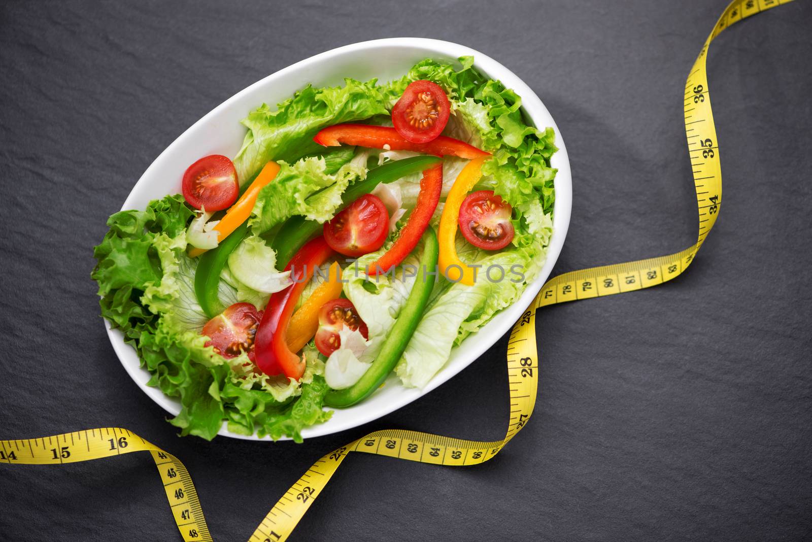 Healthy fitness meal with fresh salad. Diet concept.