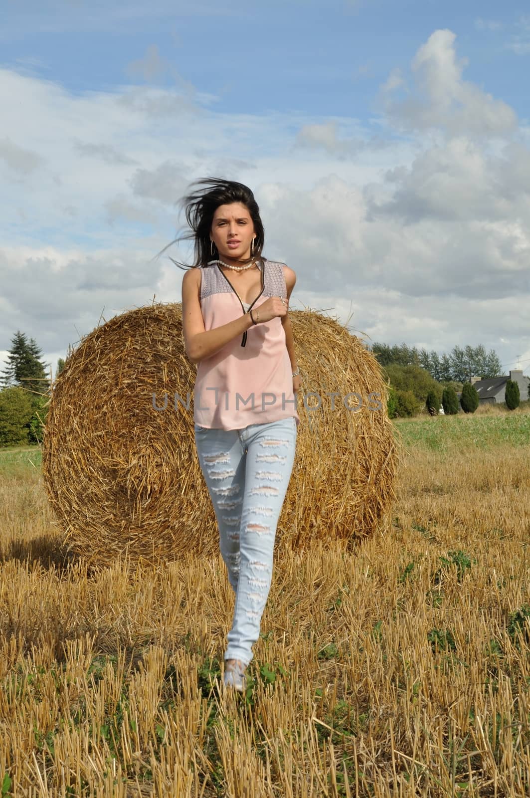 Young woman in field by BZH22
