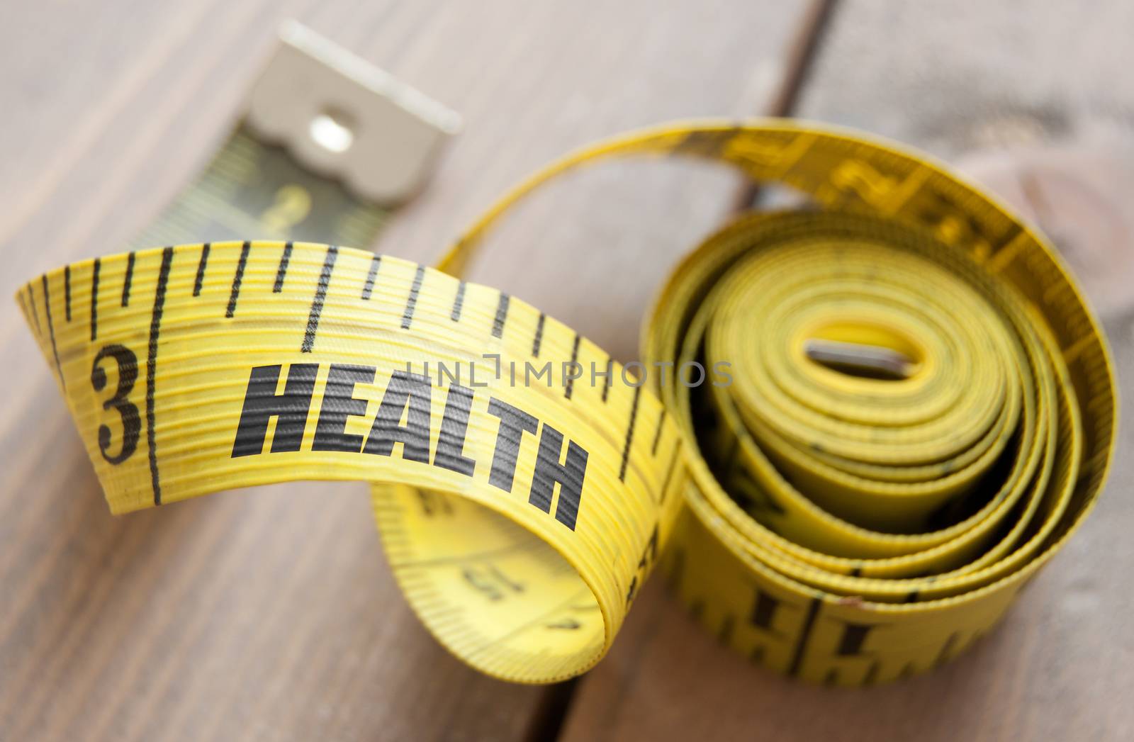 Close up of the word health printed on a tape measure