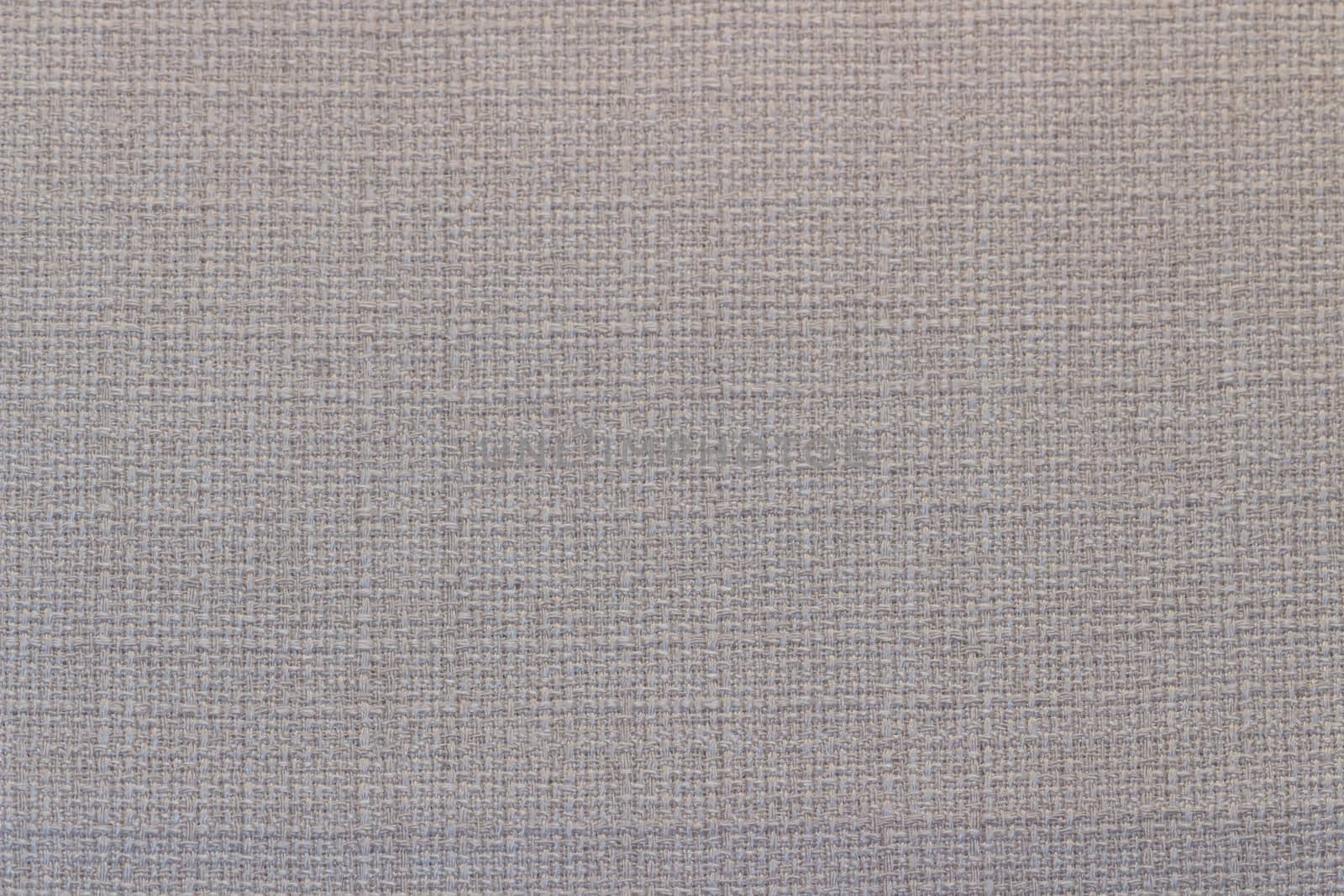 Rustic canvas fabric texture in cream color.