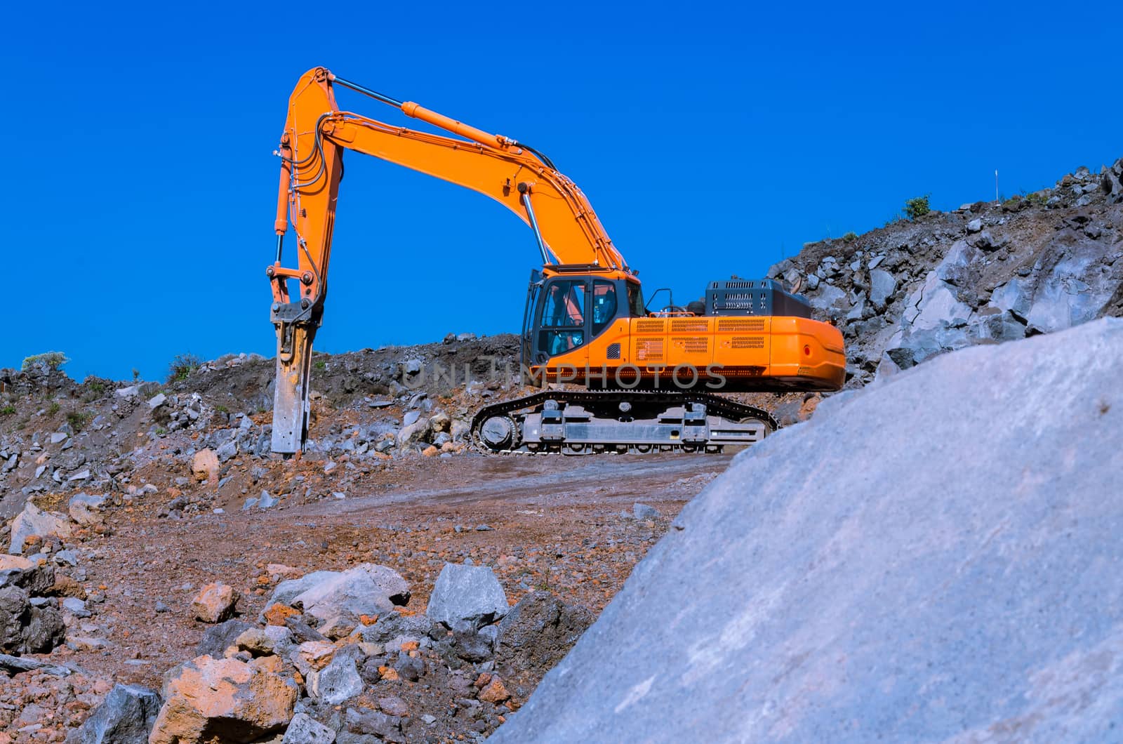 the excavator in a mine in a day's work