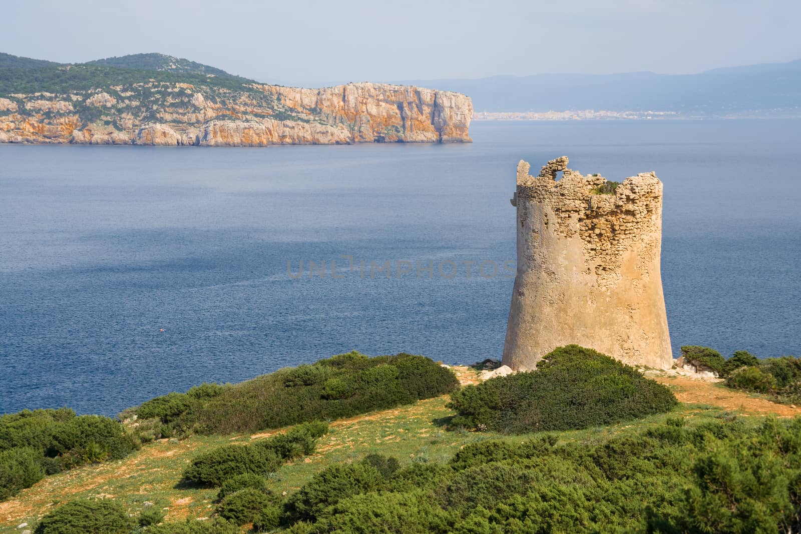 Tower near the sea. Capo Caccia. Sardinia island. Italy by rainfallsup