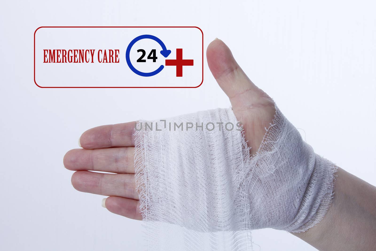 White medical dressing on a traumatized female hand