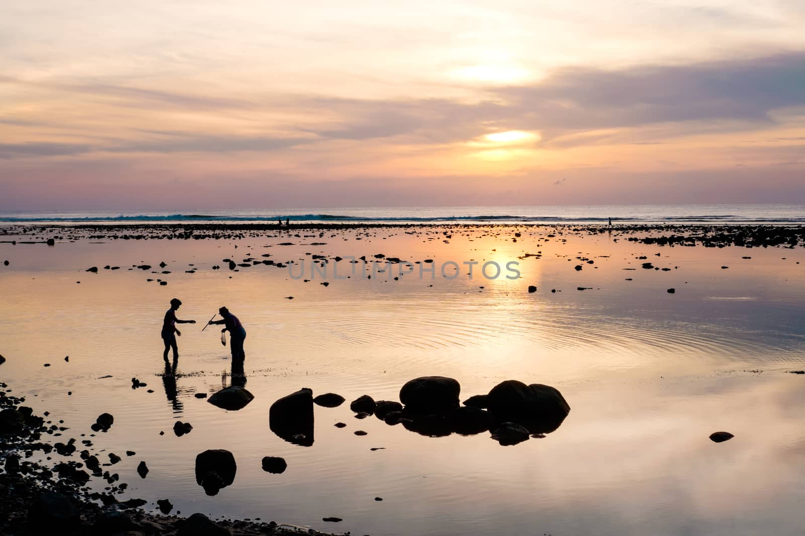 Crab catchers and the colorful beautiful sunset in Phuket. Thail by rainfallsup