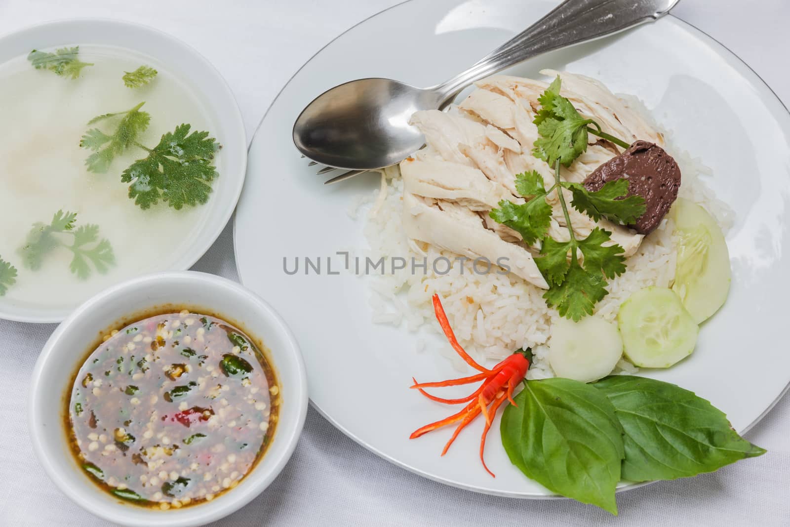 Rice steamed with chicken soup by photosam