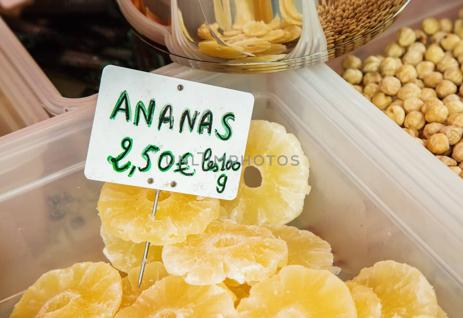 Pineapple ("Ananas" in French) , slices of dried pineapple at the food market