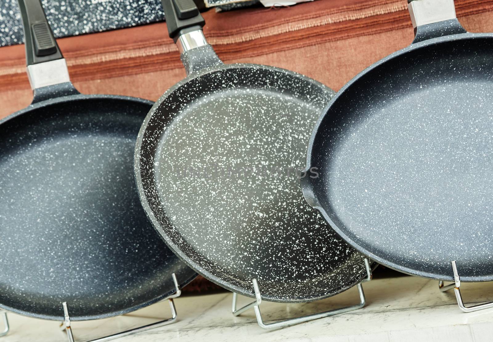 Ceramic pans to sell in a local market by pixinoo