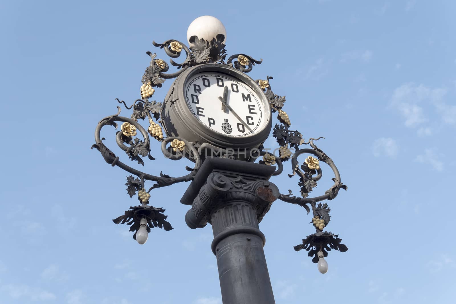 Clock old lamppost on the street, Jerez de la Frontera, Spain