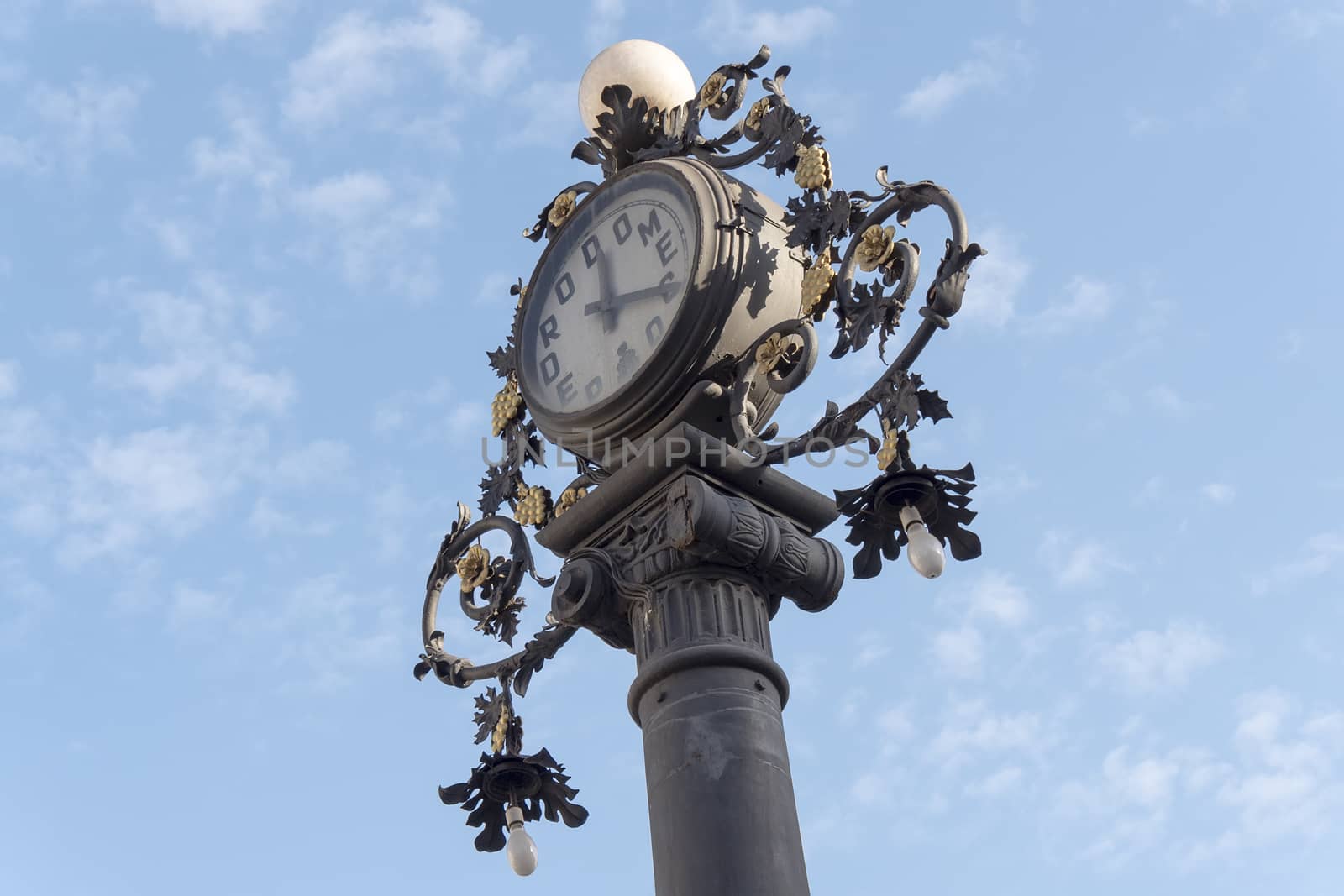 Clock old lamppost in the street, Jerez de la Frontera, Spain