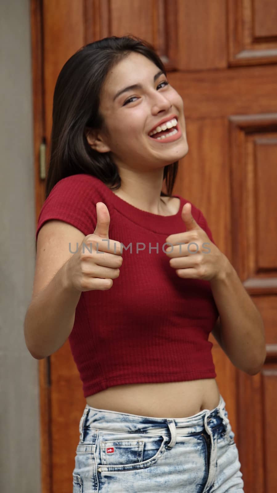 Girl Giving Thumbs Up by dtiberio