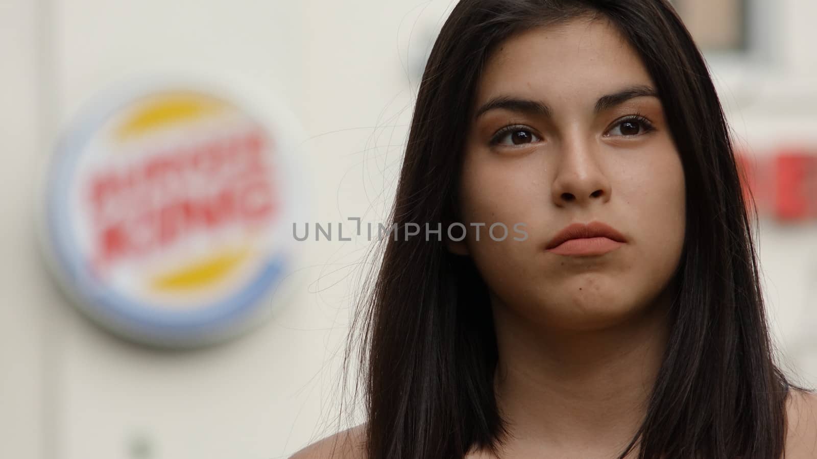 Teen Girl At Fast Food Restaurant by dtiberio