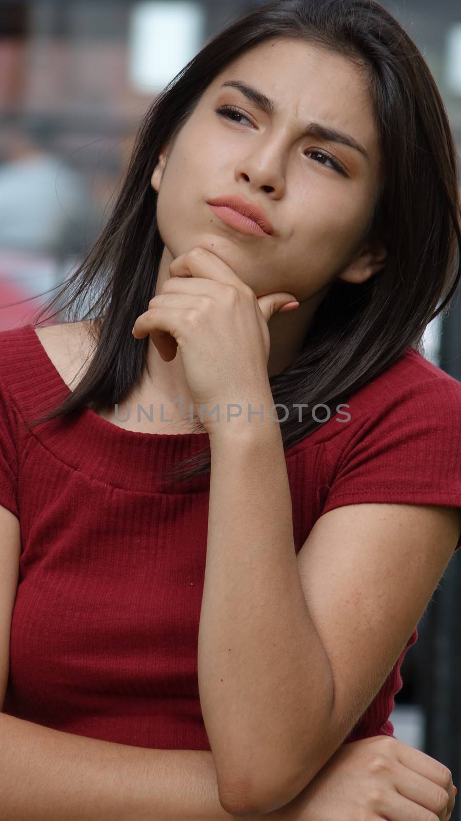 Female Teen Thinking Or Wondering