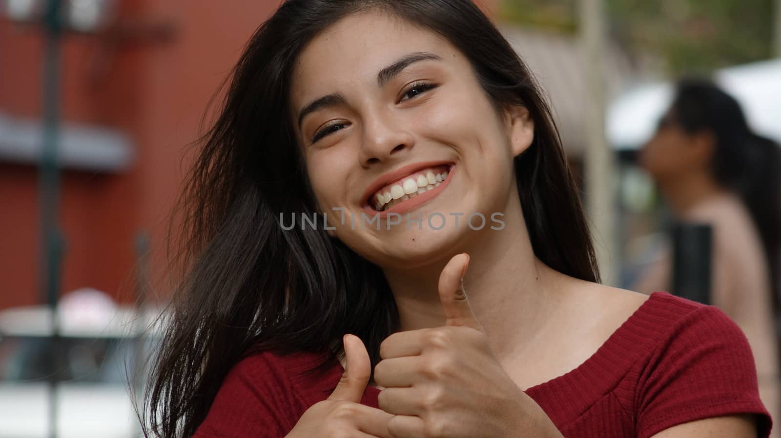 Happy Teen Thumbs Up by dtiberio