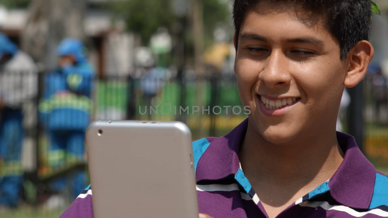 Teen Boy Using Tablet
