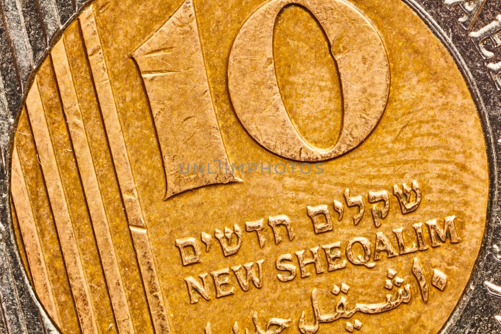 Ten shekel coin macro isolated on white surface