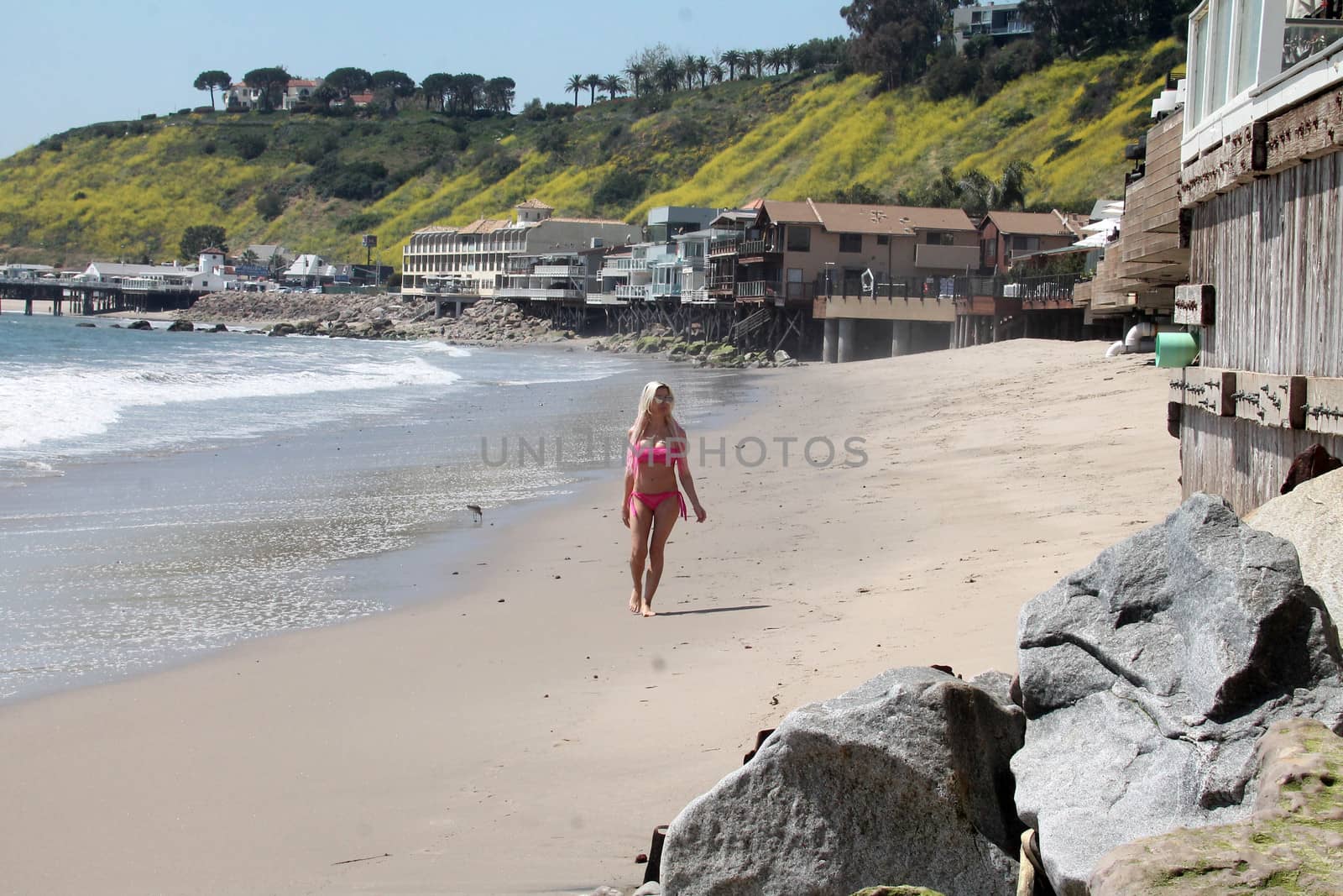 Frenchy Morgan the "Celebrity Big Brother" Star is spotted doing yoga and karate on the beach while wearing a tiny pink bikini, Malibu, CA 04-21-17/ImageCollect by ImageCollect