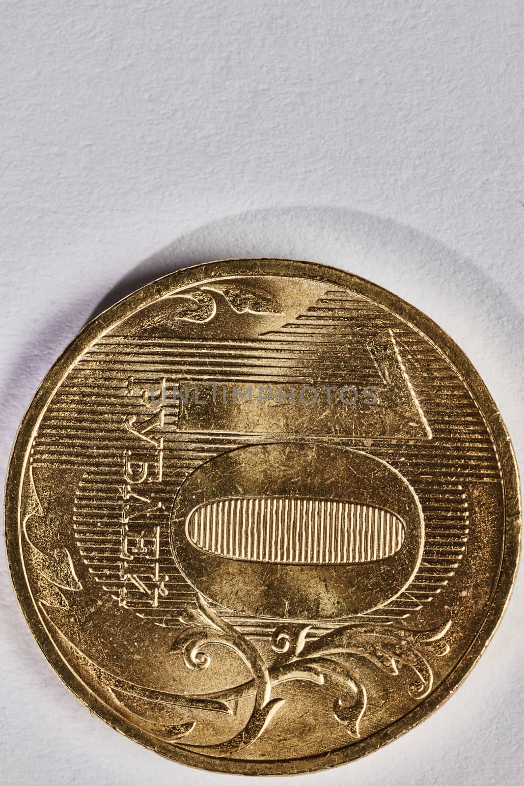 Rubl coins macro isolated on white surface