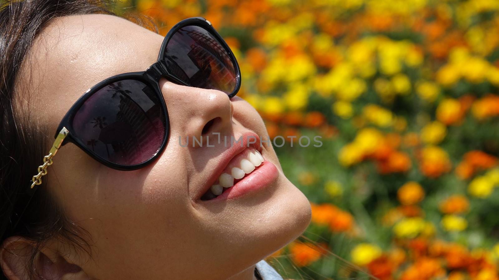 Teen Girl Smiling With Sunglasses by dtiberio