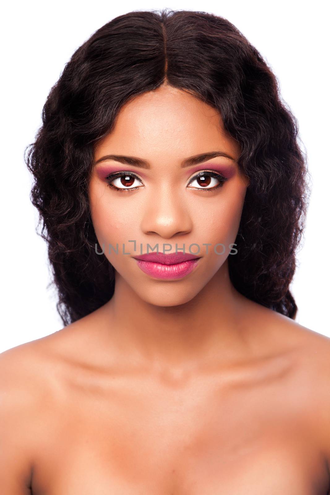 Beautiful face of black African woman with makeup cosmetics and curly hair, skincare concept.