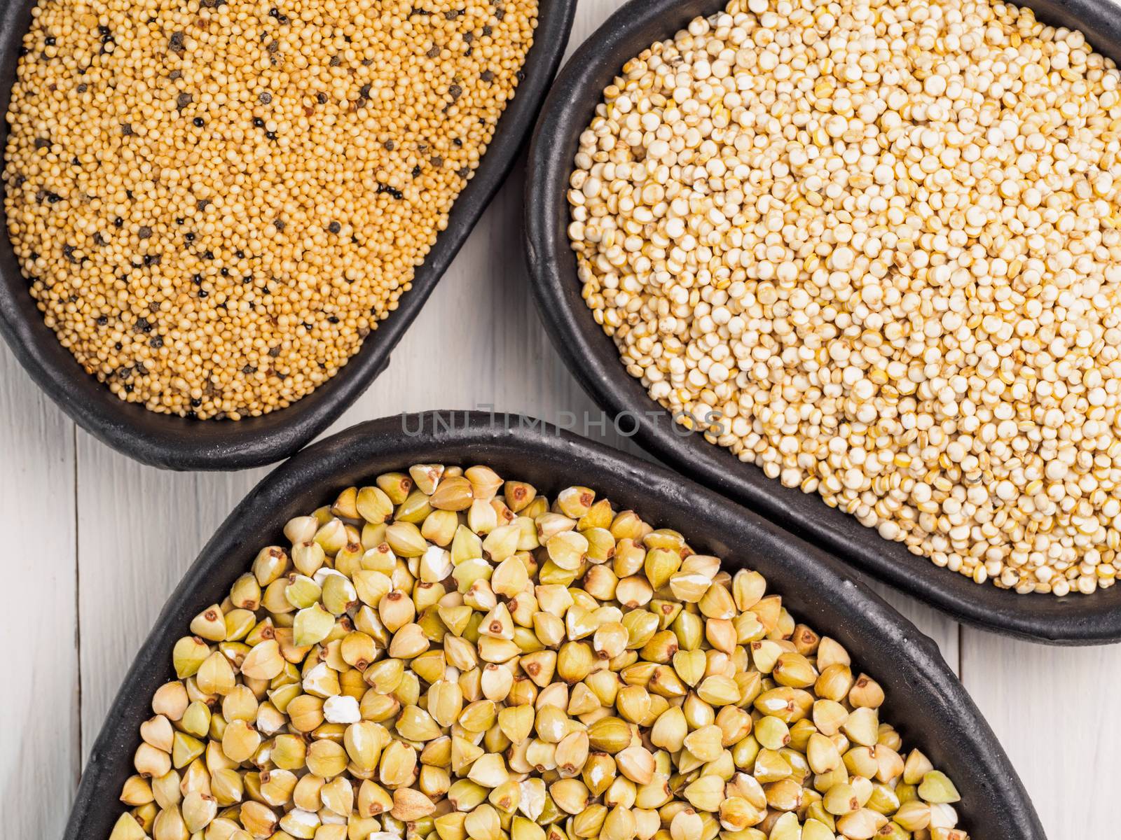Green buckwheat, amaranth seeds and quinoa by fascinadora