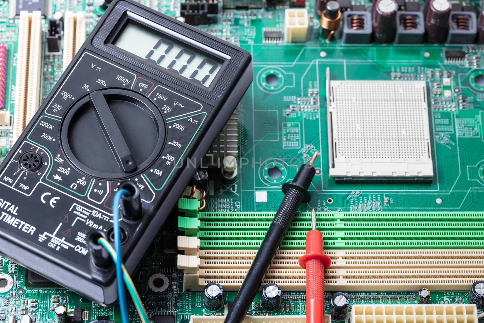 Electronic measuring tool close-up on a computer board