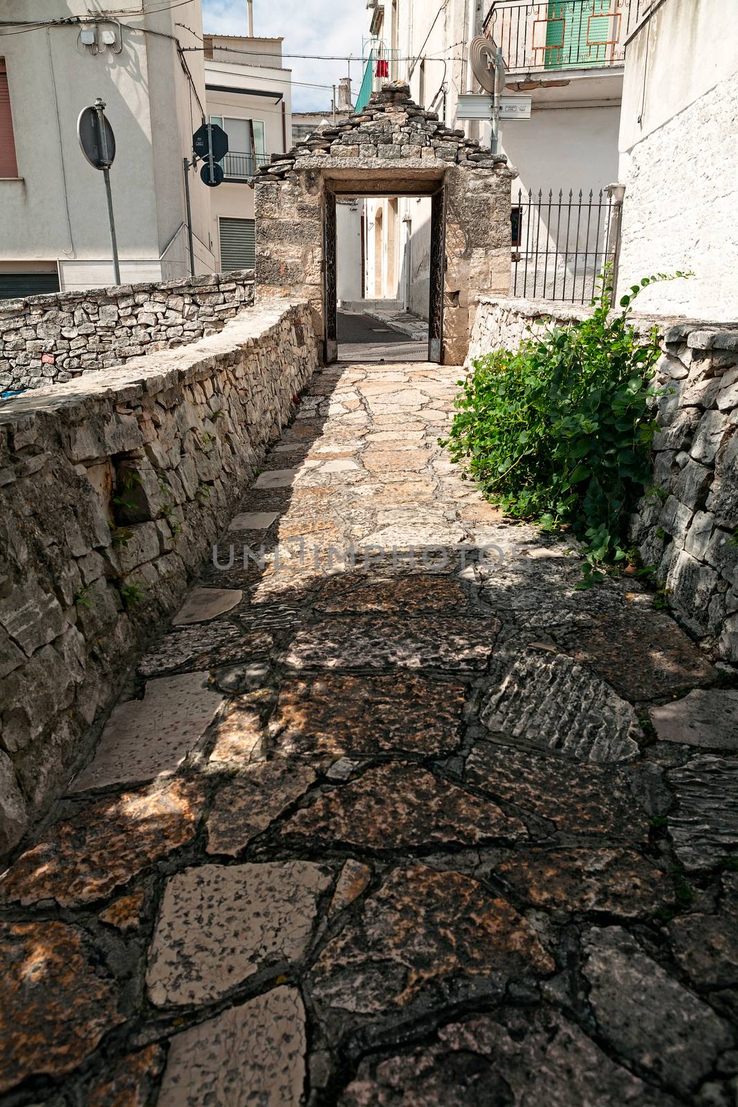 An old street to connect the old town with the new one in Alberobello in Apulia, Italy