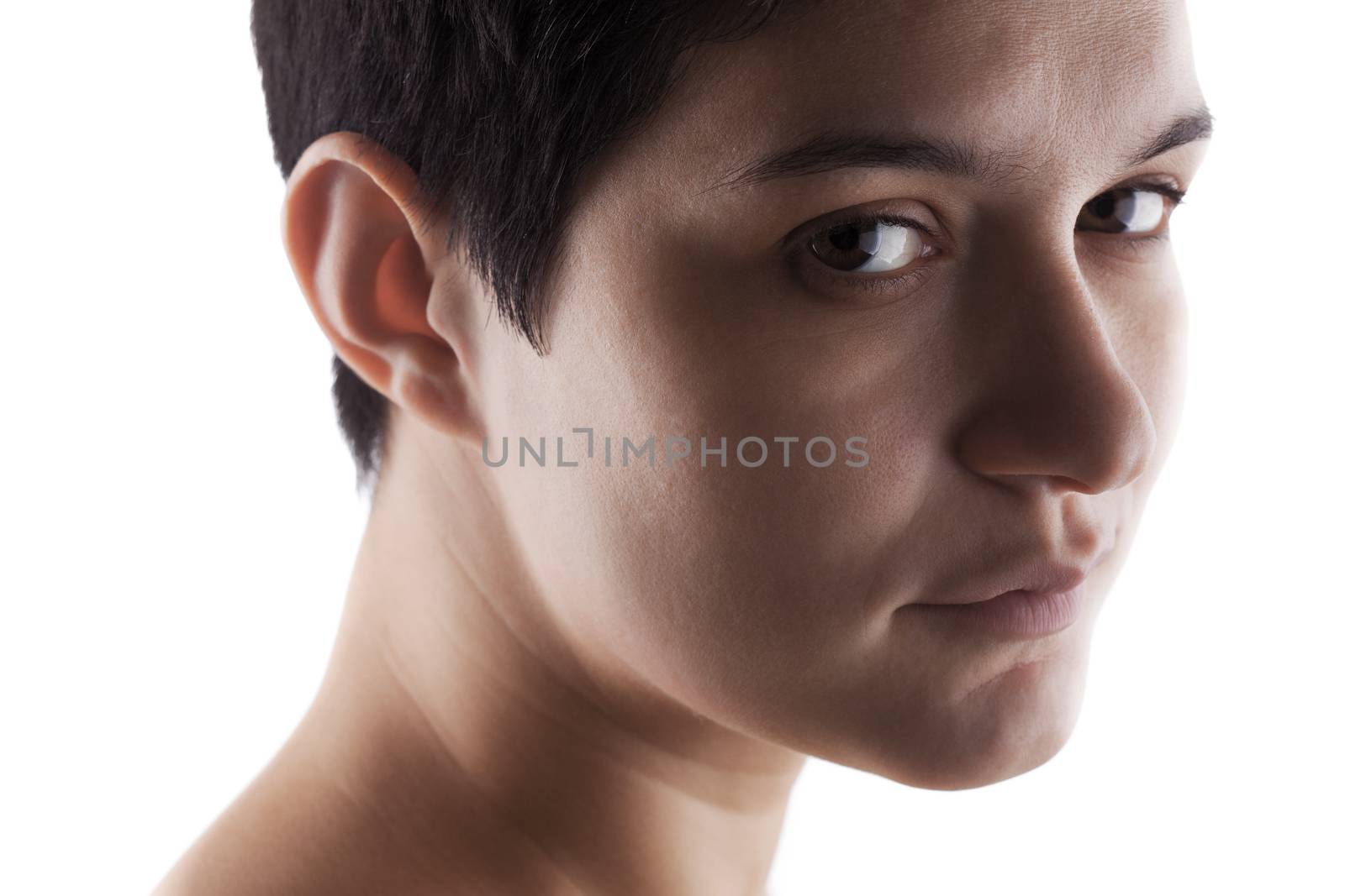 portrait of a girl with a short hair looking at camera, serious expression