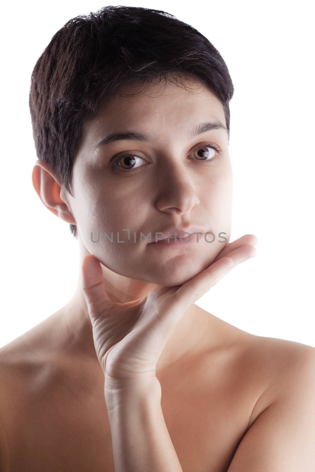 girl with a short hair touching her face